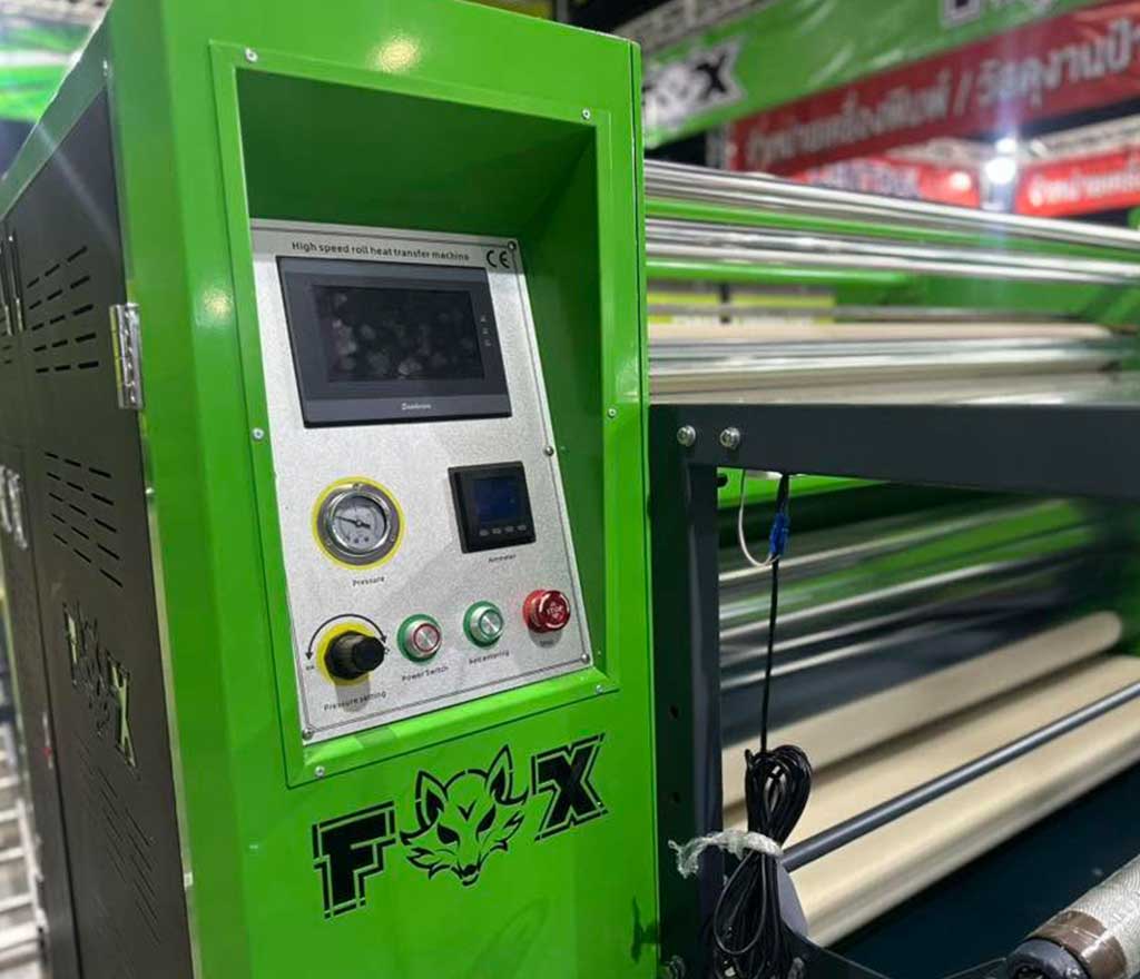 Industrial digital textile printer printing a pattern onto polyester fabric