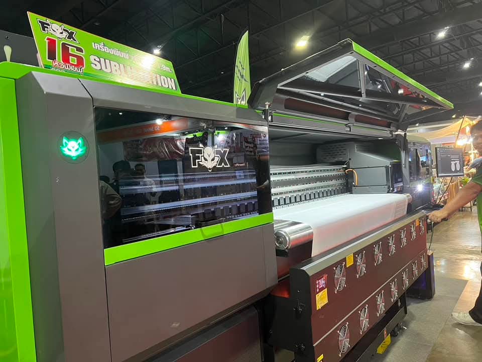 A wide-format digital printing machine producing a printed textile pattern